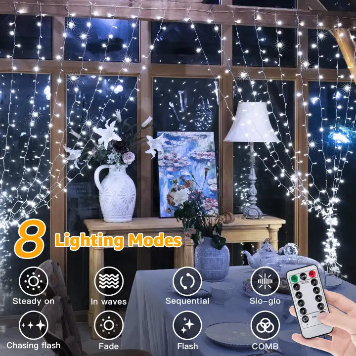 Ollny 300 LEDs 3m*3m Christmas Curtain Fairy Lights (Cool White, Clear Cable, Plug in, 8 Modes)