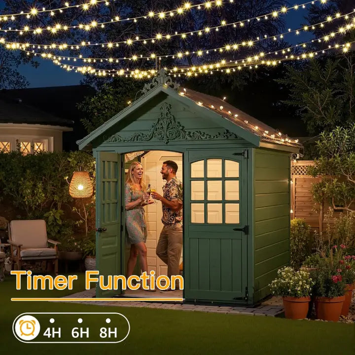 a green garden shed with string lights above, featuring a timer function display.